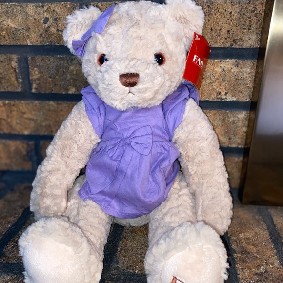 FAO Schwarz Other - FAO Schwarz bear stuffed animal. 2016 Geoffrey, Purple dress and bow.